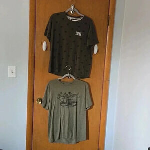 2 men's Large sized green tee shirts. 1 Lucky  brand and 1 demim & flower brand.